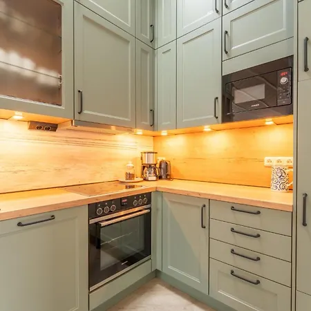 12 Personen Familienferienhaus Mit Sauna, Whirlpool, Zwei Duschen Und Toiletten, Kaminofen Und Kanu In 1. Reihe Zum Mit Wundervollem Seeblick In Prázdninový dům Otterndorf